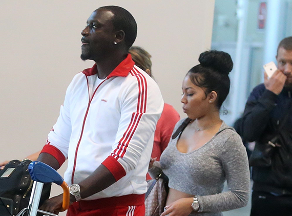 Akon steps out with one of his wives in France (photos)