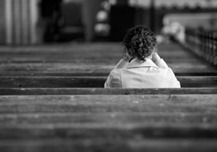 womanalonechurchpew
