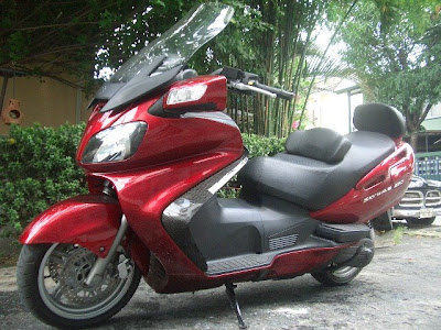 Suzuki Skywave 650 Specifications. women motorcycle rider