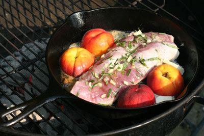 peaches and pork in skillet