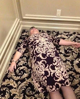 WOMAN SLEEPING ON THE CARPET WITH MATCHING CLOTHES