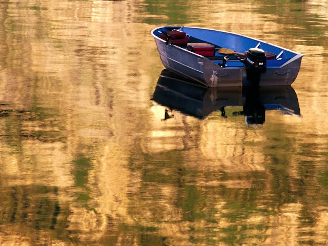 Plastic boat on lake