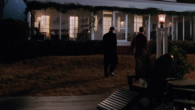 Dawson and Pacey walking together into the Leery house