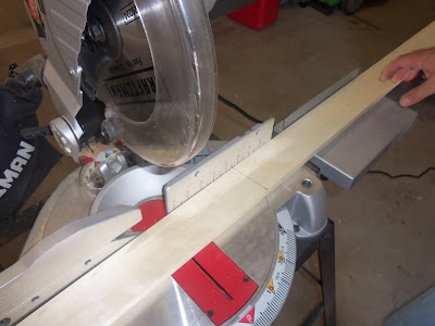 Bringing Home Ezra: How to glue wood moulding to a mirror to create a 