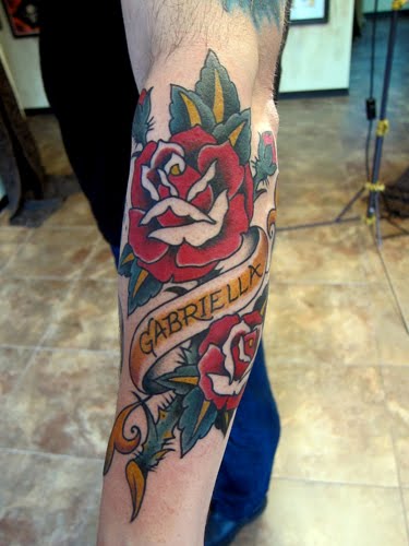 Christian came back to get a rose for his daughter tattooed on his forearm