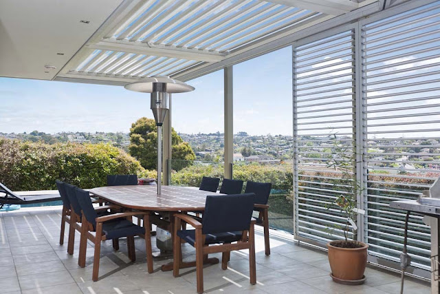 Photo of garden furniture on the terrace by the pool