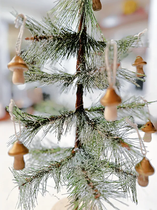 small tree with mini mushroom ornaments
