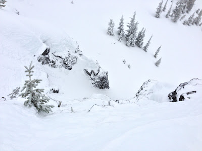 Looking into a chute with fresh snow