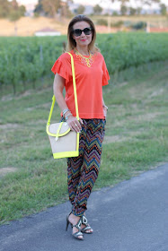 Summer outfit with light printed pants, neon color straw bucket bag, Fashion and Cookies