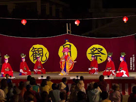 classic Okinawa dance, ladies in red kimonos