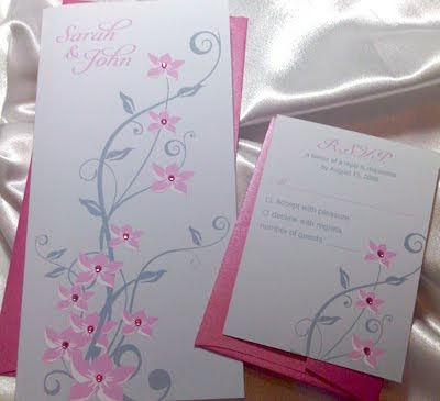 These custom designed Pink Grey Cherry Blossom wedding invitations are