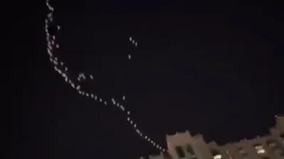 Large formation of UFOs over city caught people's imagination.