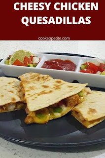 Incredible cheesy chicken quesadillas that are packed with chicken, onion, garlic, peppers and cheese. They are easy to make and are perfect for a picnic.