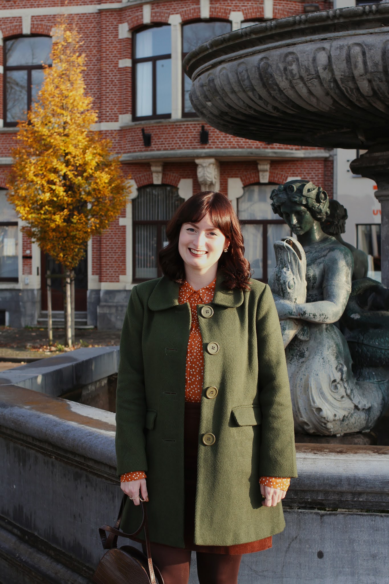 An autumnal outfit featuring a Princess Highway olive green coat