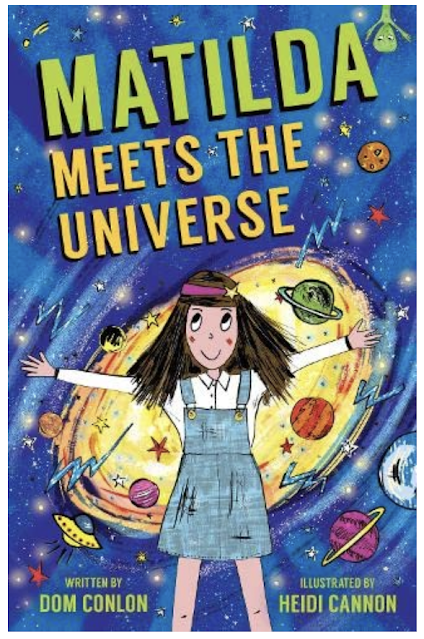 Large book cover same as small. Matilda stands in blue pinafore dress, white blouse and pink hair band with a star on. The backdrop is a blue space scene, and immediately behind Matilda is a swirling mass of the galaxy planets and lightning bolts in yellow. The title is in block captitals, with Matilda in big green letters and the rest in smaller yellow letters. Writers and artist names are in green either side of Matilda's legs.