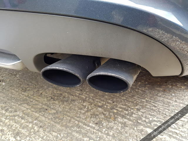 Audi S5 standard quad exhaust tips dirty sooty