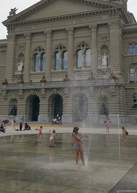 The Bundesplatz square in front of the Swiss Parliament House has fountains of another kind. It is nice to see kids having fun so near to a place that is so serious.