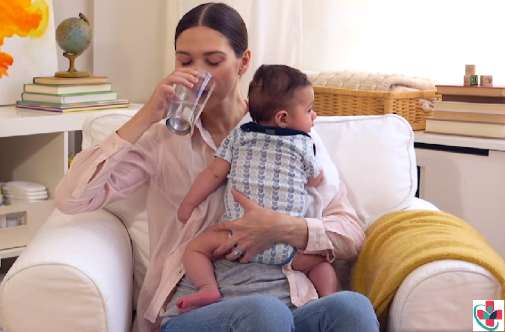 Breastfeeding mom drinking water