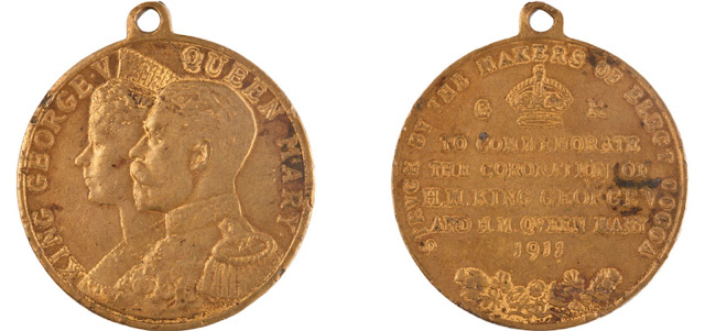 A commemoration medal for George V's coronation from 1911 'struck by Elect Cocoa'