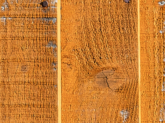 Wood panels orange hue texture