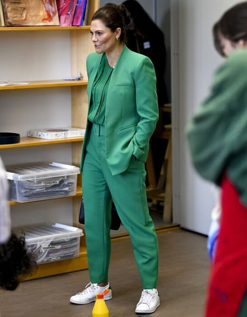 Crown Princess Victoria wore a green lapelless fitted blazer by Zara, and slim fit trousers by Zara. Green pleated front blouse. Adidas