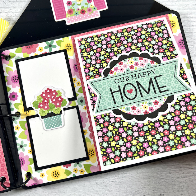 home scrapbook album folding page with flowers and photo mats