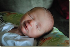 Relaxing in the Boppy pillow--5 days old