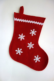 sewing on a stocking, monogram on a stocking, felt stocking, stocking embroidery