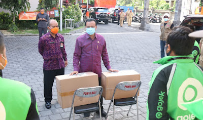  30 ribu Masker Diberikan Pemprov Bali Untuk Pelaku Ojol