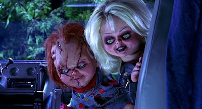 Brad Dourif and Jennifer Tilly plan their murder spree as Chucky and Tiffany in "Bride of Chucky" (1998)