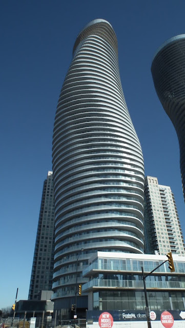 Photo of the towers as seen from the street looking up