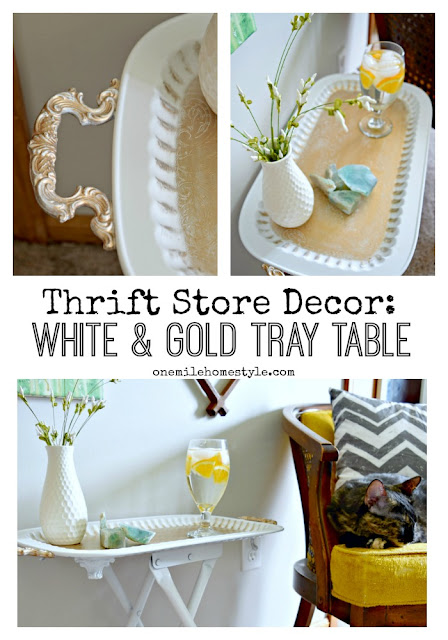 You won't believe what this beautiful accent table looked like before this blogger got ahold of it! DIY Thrift Store White and Gold Accent Table - One Mile Home Style