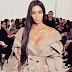 After being held at gunpoint by 2 armed men inside her Paris hotel room, Kim Kardashian unharmed
