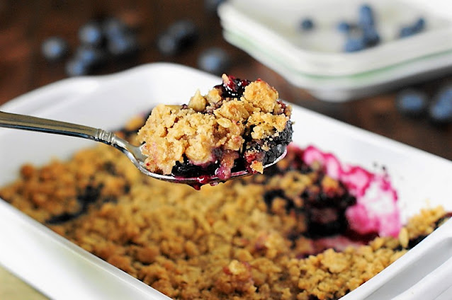 Serving Spoon of Blueberry Crisp Image