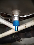 . you need to get one installed. This will make life much easier for you . (oil drain)