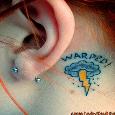 hayley williams have a small tattoo designs on behind ear with cloud tattoos