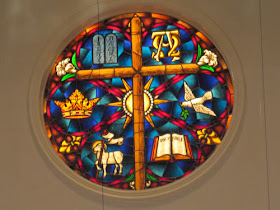 stained glass symbols of Jesus