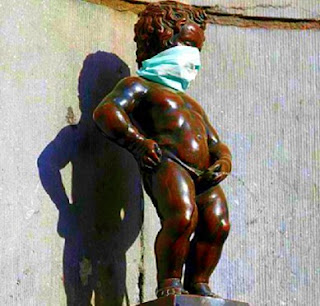 The 'Manneken pis,' - the bronze statue of the little boy urinating protects himself from the coronavirus