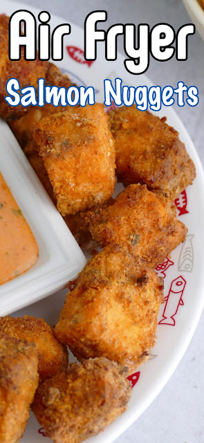 salmon nuggets on a white plate with a bowl of dipping sauce and recipe title text overlay.