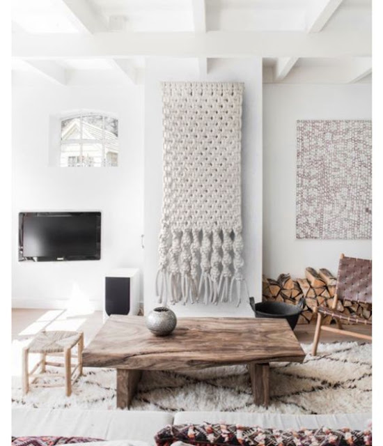 rustic, nordic interior with a large macrame and moroccan rug