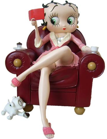 Cartoon Girl Sitting On Chair. sitting in a chair reading