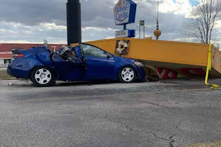 One dead two injured after Denny's sign falls on car in Kentucky