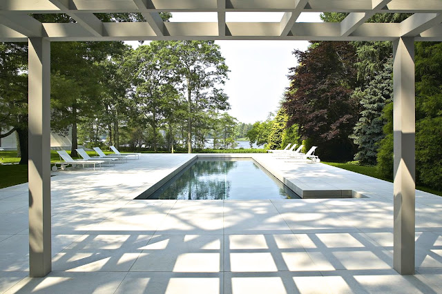 modern georgica pond pool hamptons white lounge chairs outdoor patio yard bates masi architects