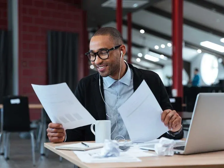 Man checking Bank's Document