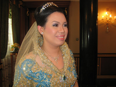  handmade turquoise and gold wedding gown diamonds and a delicate tiara