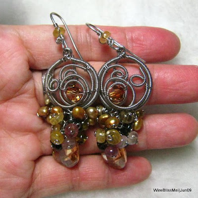 Holding the Wire Wrapped/Coiled Earrings - Fruity