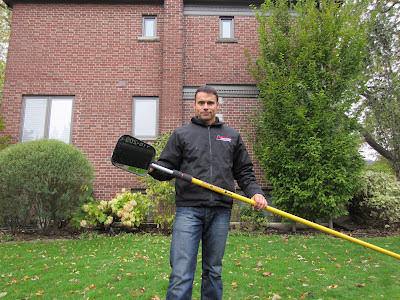 Darren with estimator mirror, ready to estimate eavestroughs