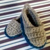 http://www.craftsy.com/pattern/crocheting/accessory/tomtoms-baby-shoe/113374?SSAID=924082