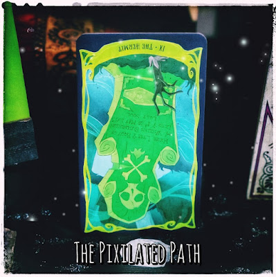 The Hermit card from Disney's Hocus Pocus Tarot in the reversed position.