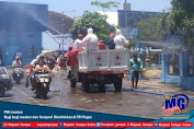 PMI Jember Bagi bagi masker dan Semprot Disinfektan di TPI Puger